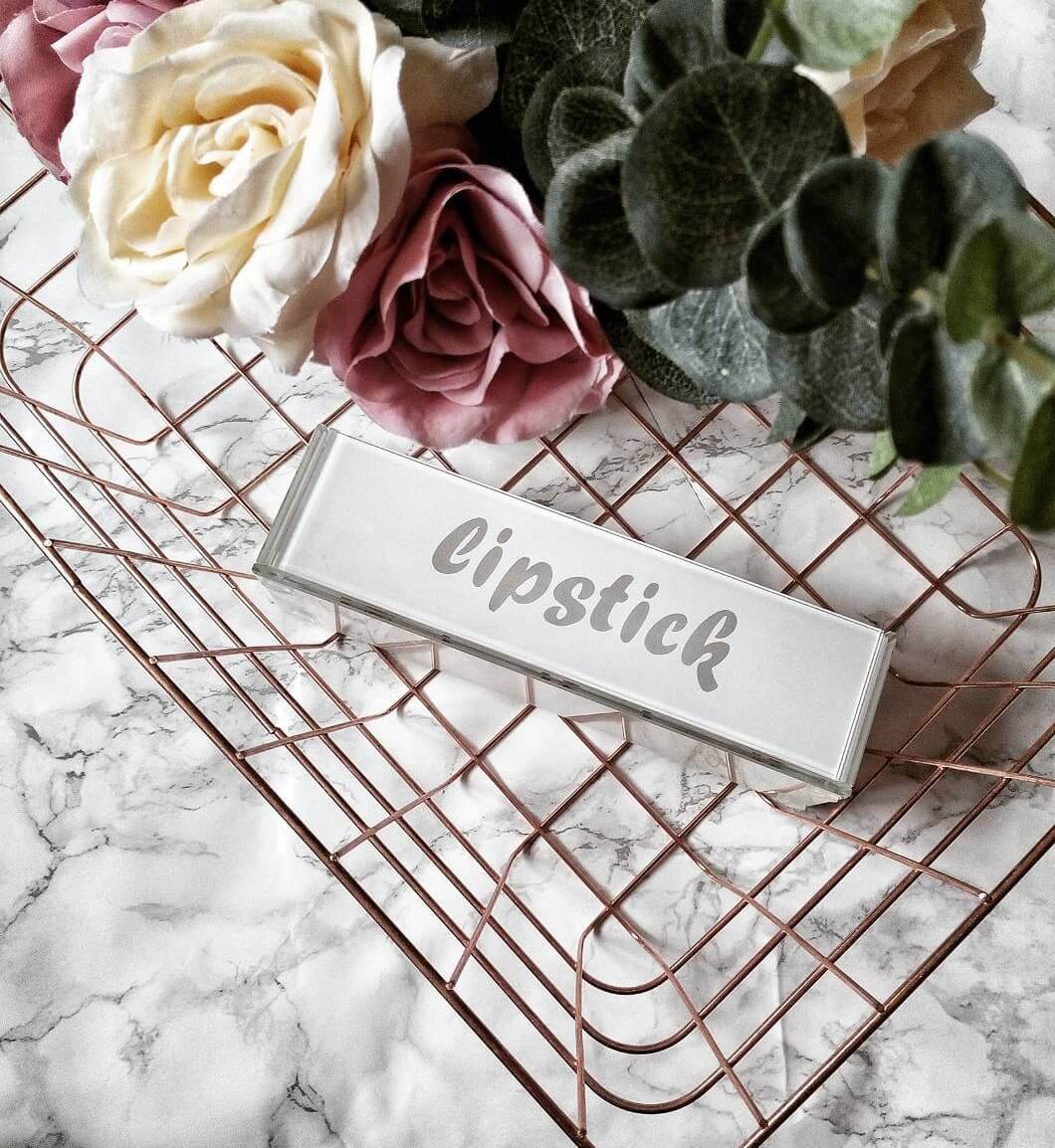 Mirrorina white glass lipstick stand organizer with 20 lipstick slots on makeup table