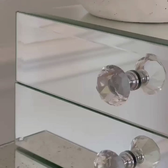 Mirror organizer with 2 drawers by Mirrorina on a mirrored console, focused on edges and materials, with a white wall and molding in the background.