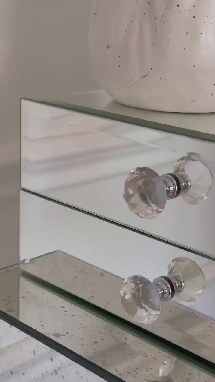 Mirror organizer with 2 drawers by Mirrorina on a mirrored console, focused on edges and materials, with a white wall and molding in the background.